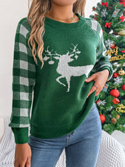 Green acrylic sweater with white reindeer graphic and plaid sleeves.