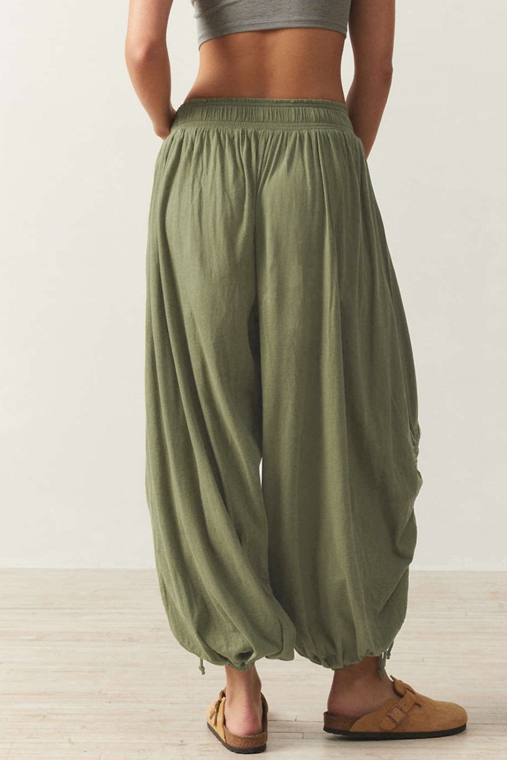 Matcha green gathered ankle-tie balloon trousers with elastic waist