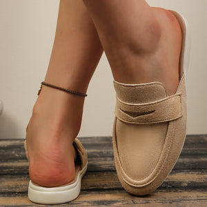 Khaki textured round toe slip-on loafers with a backless design.