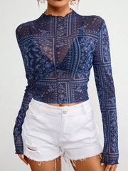 Dark blue mesh mock neck top with bandana print and lettuce trim