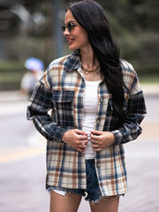 Colorblock plaid utility shacket in navy with button front and chest pockets.