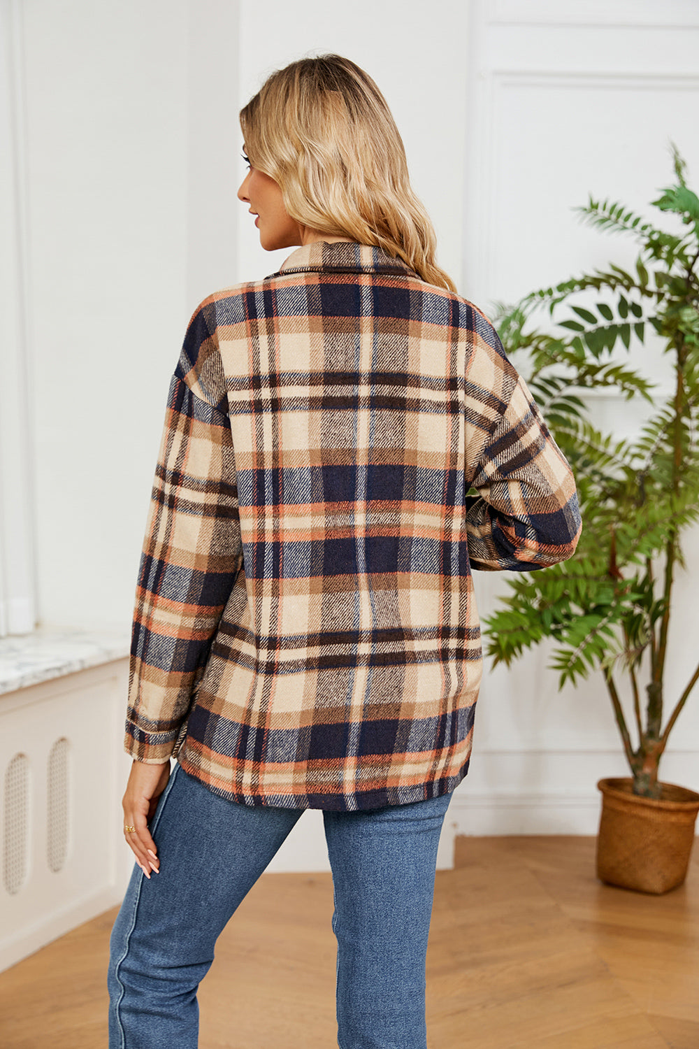 Soft plaid overshirt with button front and patch pockets in tan and navy plaid.
