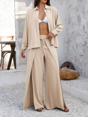 Tan split-front palazzo pants and button-down shirt set with adjustable waist.
