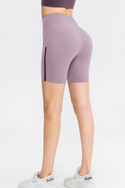 Lilac bike shorts with black mesh side insets and a high waist.