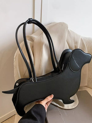 Black PU leather dachshund shoulder bag with top handles and zipper closure.