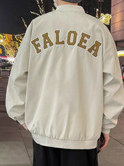 Apricot bomber jacket with "FALOE A" embroidered on the back.