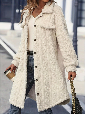 Cream textured shacket-coat with patch pockets and button front, worn open over a white top.