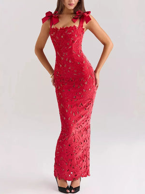 Red floral lace maxi dress with tie shoulder straps and cutout details.