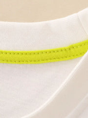 White cotton toddler t-shirt with bright lime green neckline trim.
