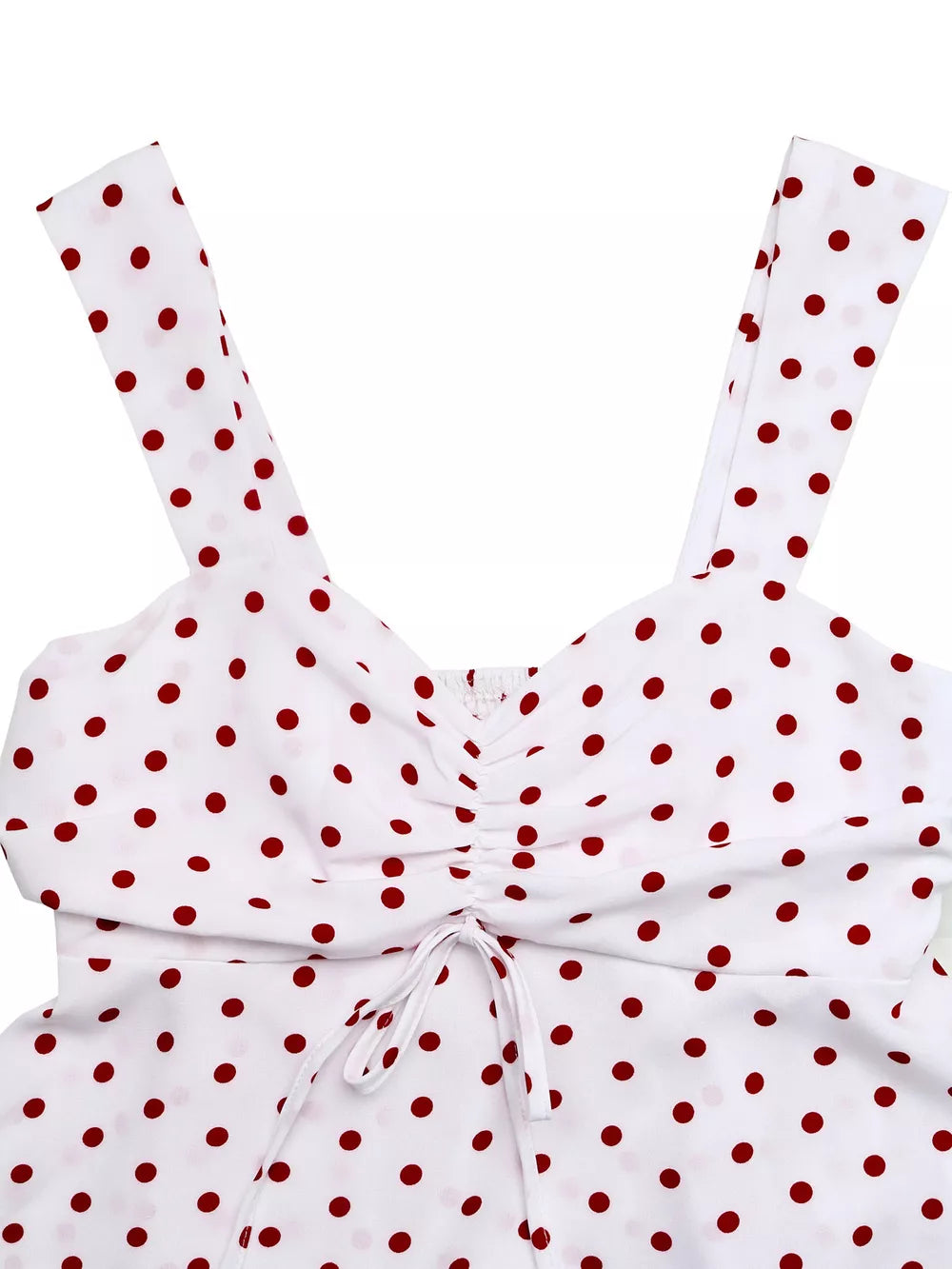 White polka dot camisole with ruched front and tie detail