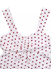 White polka dot camisole with ruched front and tie detail