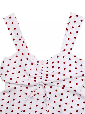 White polka dot camisole with ruched front and tie detail