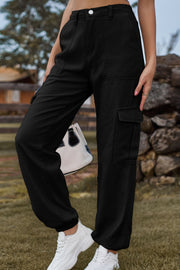 Black utility cargo pants with multiple pockets and cuffed ankles.