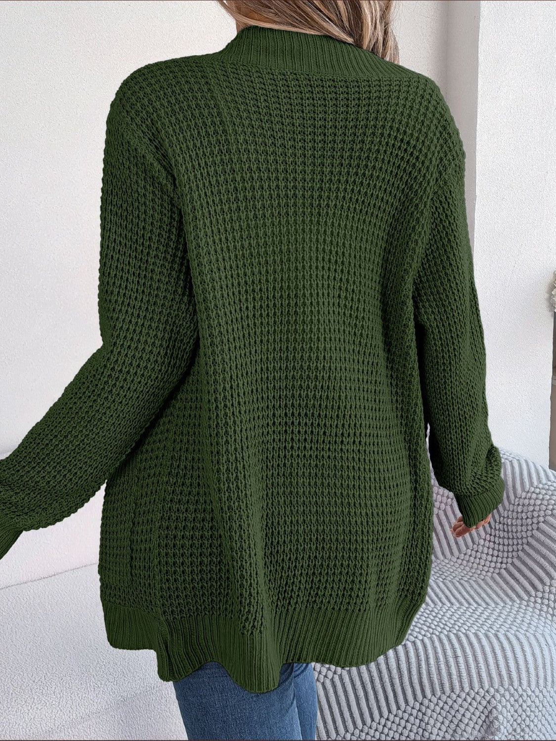 Army green textured knit open-front cocoon cardigan with long sleeves and a relaxed fit.