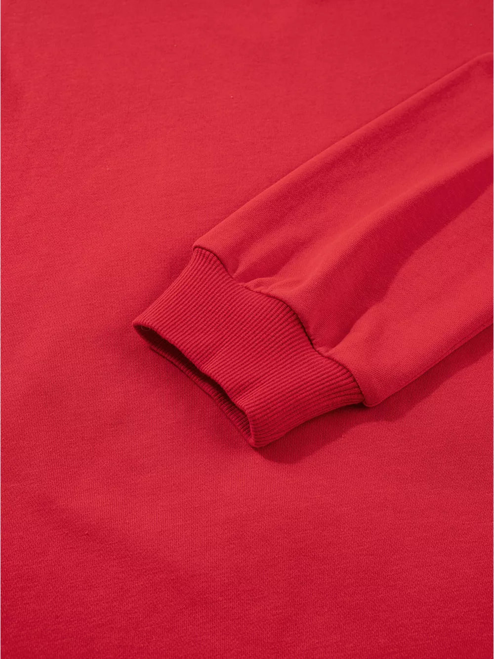 Red cotton sweatshirt with ribbed cuffs and hem detail.