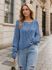 Dusty Blue cable knit cocoon sweater with crew neck and textured acrylic knit.