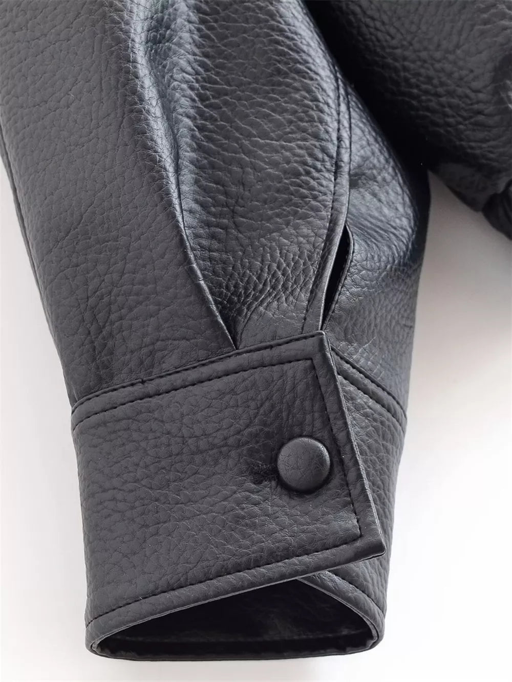 Asymmetrical Faux Leather Moto Jacket in Black, model styling view