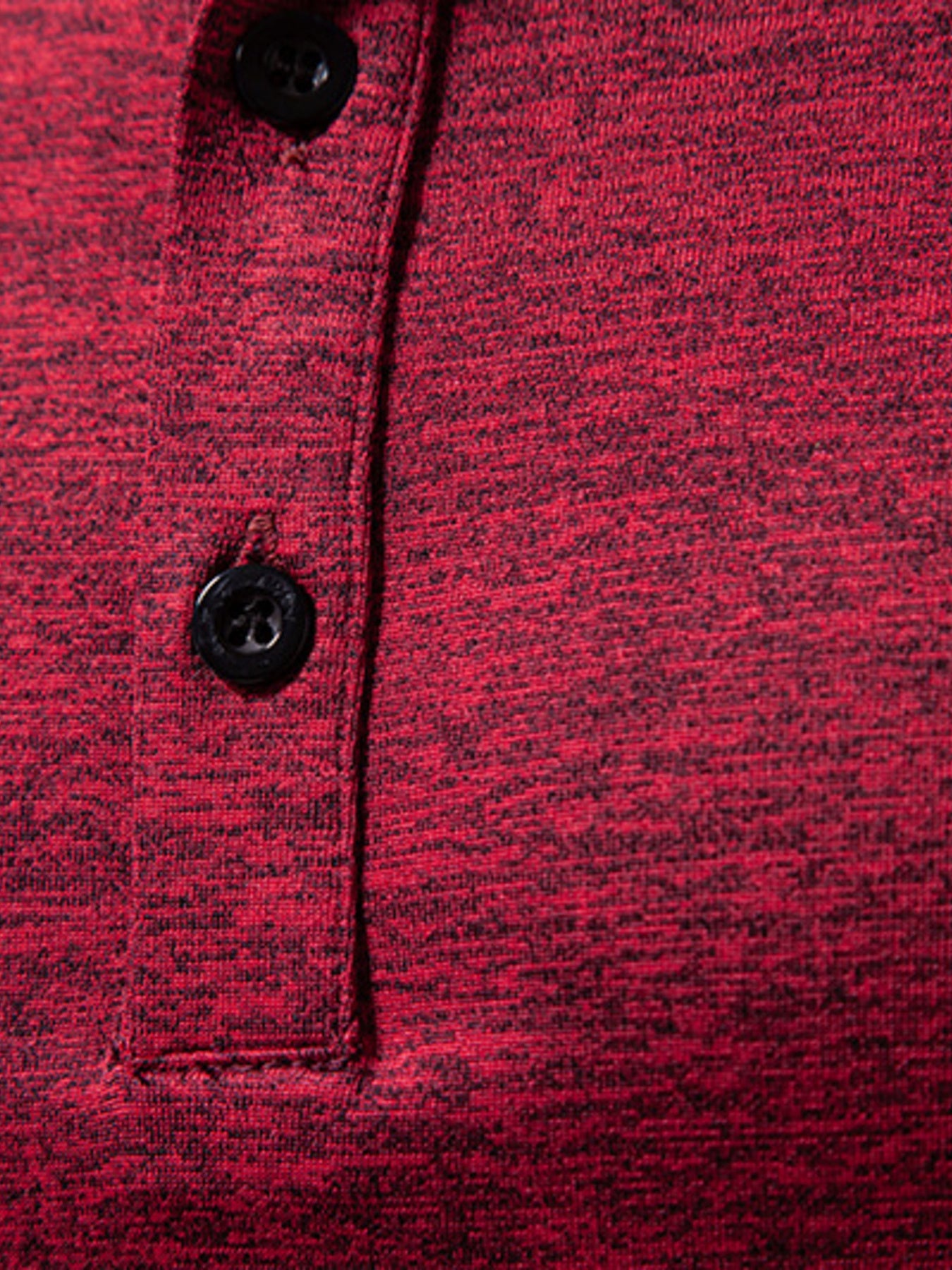 Burgundy mélange cotton henley tee with black buttons and curved hem detail.