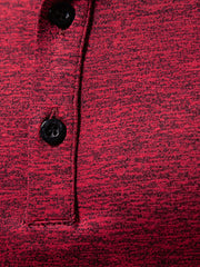 Burgundy mélange cotton henley tee with black buttons and curved hem detail.