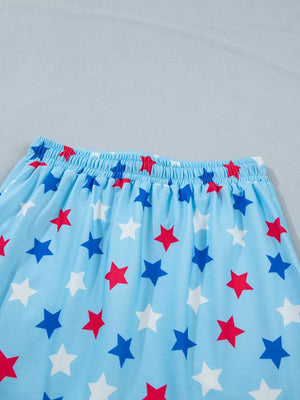Light blue skort with red, white, and blue star print and elastic drawstring waist.