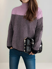 Chevron knit turtleneck sweater in lavender and black with a chevron pattern.