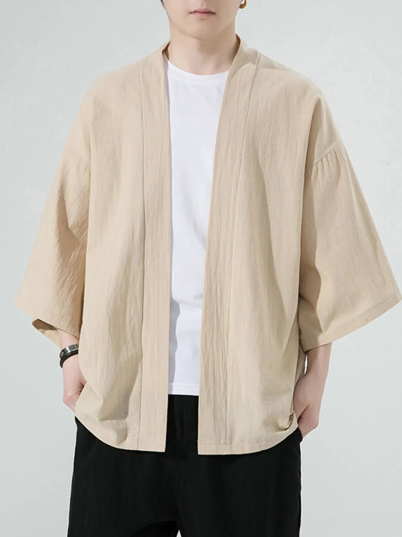 Oversized casual open front jacket in Khaki with wide sleeves and a relaxed fit.