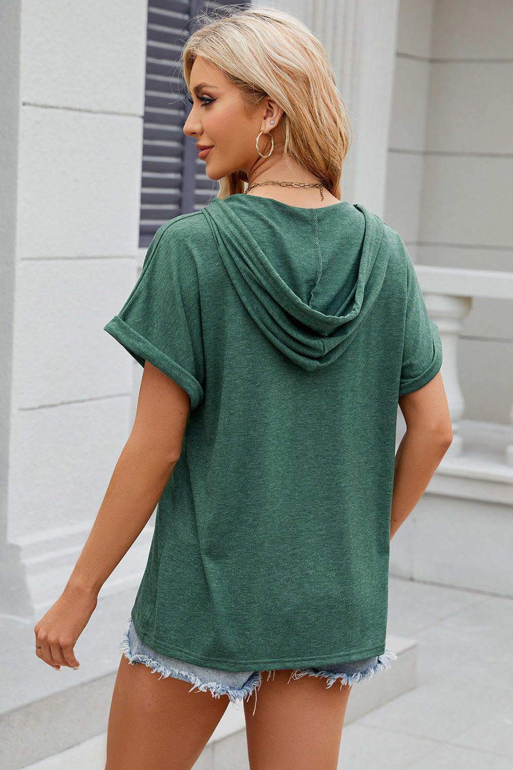 Dark Green Henley hooded tee with rolled short sleeves and a casual fit.