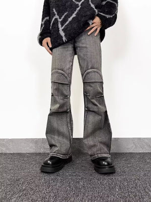 Men's relaxed fit washed flare jeans in grey denim with distressed knee details.