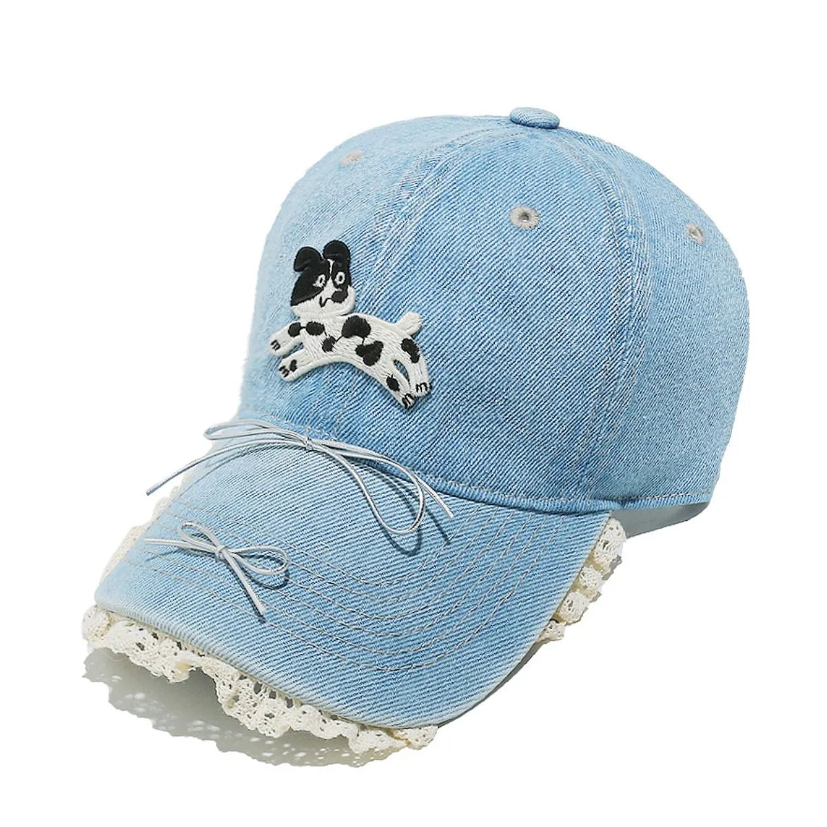 Light blue denim baseball cap with puppy appliqué, lace trim, and bow details.
