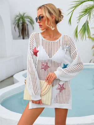 White open knit beach cover-up with sequin stars, round neck, long sleeves.