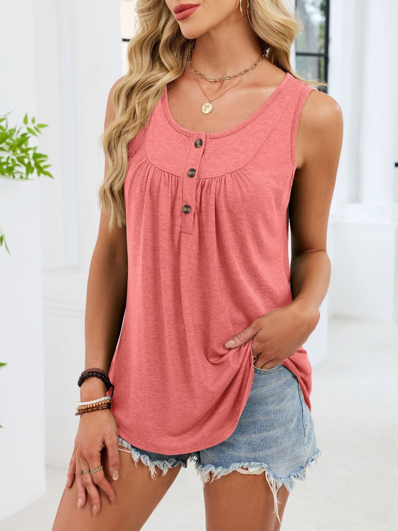 Pink button detail ruched tank top with curved hem.