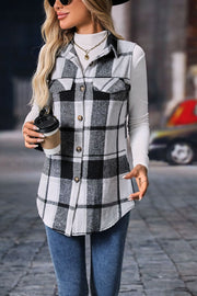 Plaid utility vest with patch pockets, button front, collared, sleeveless, gray and black plaid.