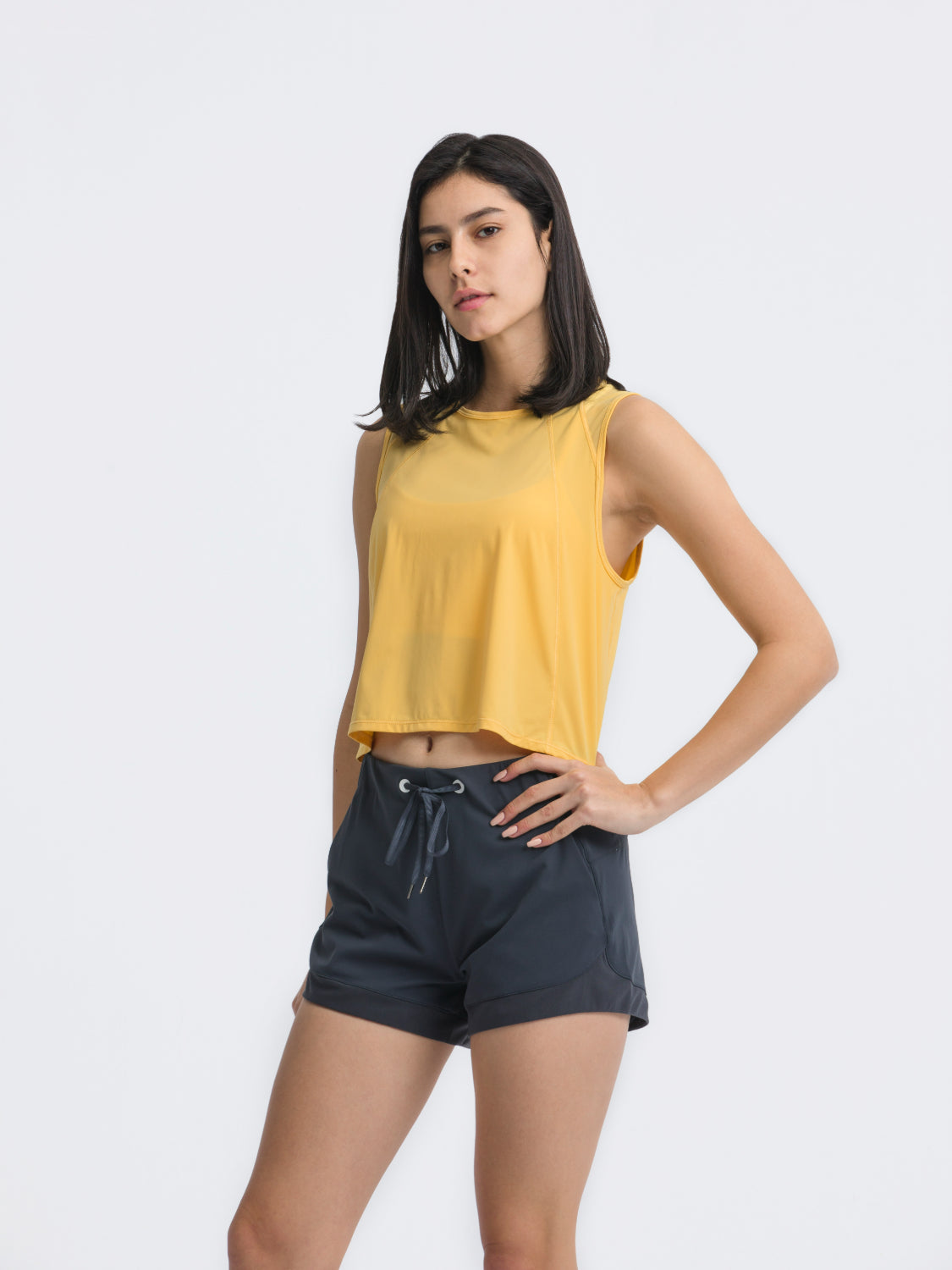 Pastel Yellow cropped active tank top with mesh inset back detail