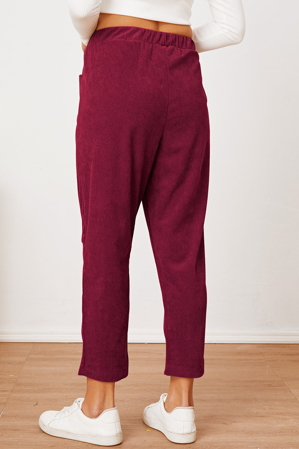 Corduroy barrel-leg utility pants in Scarlet with elastic waist and pockets.