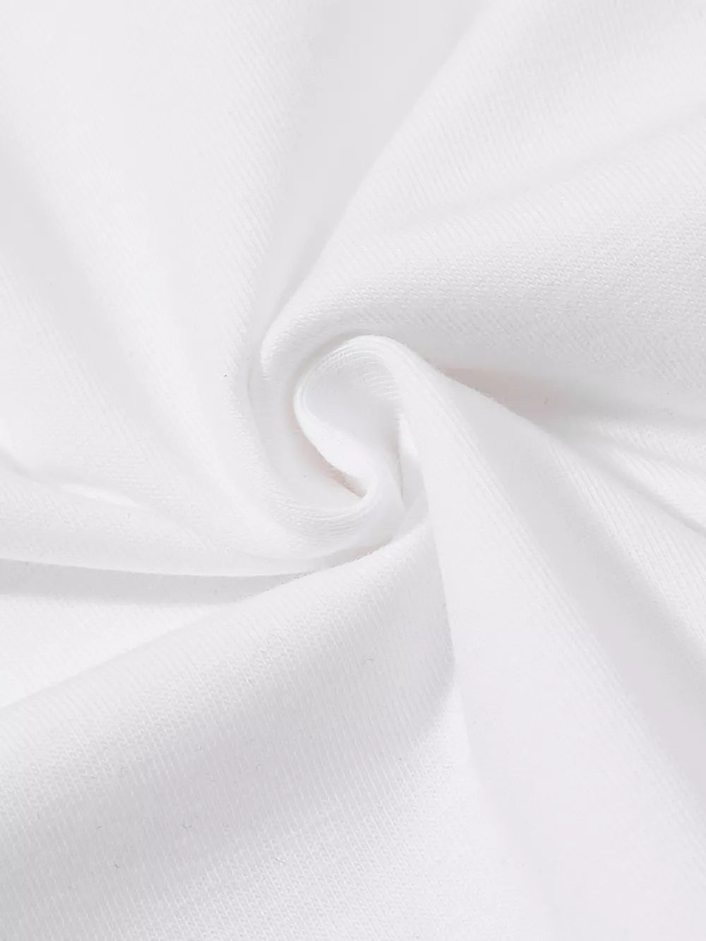 White cotton t-shirt fabric detail with soft folds and texture.