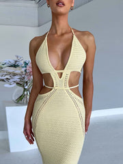Pastel yellow knitted maxi dress with deep v-neck, cutouts and backless detail
