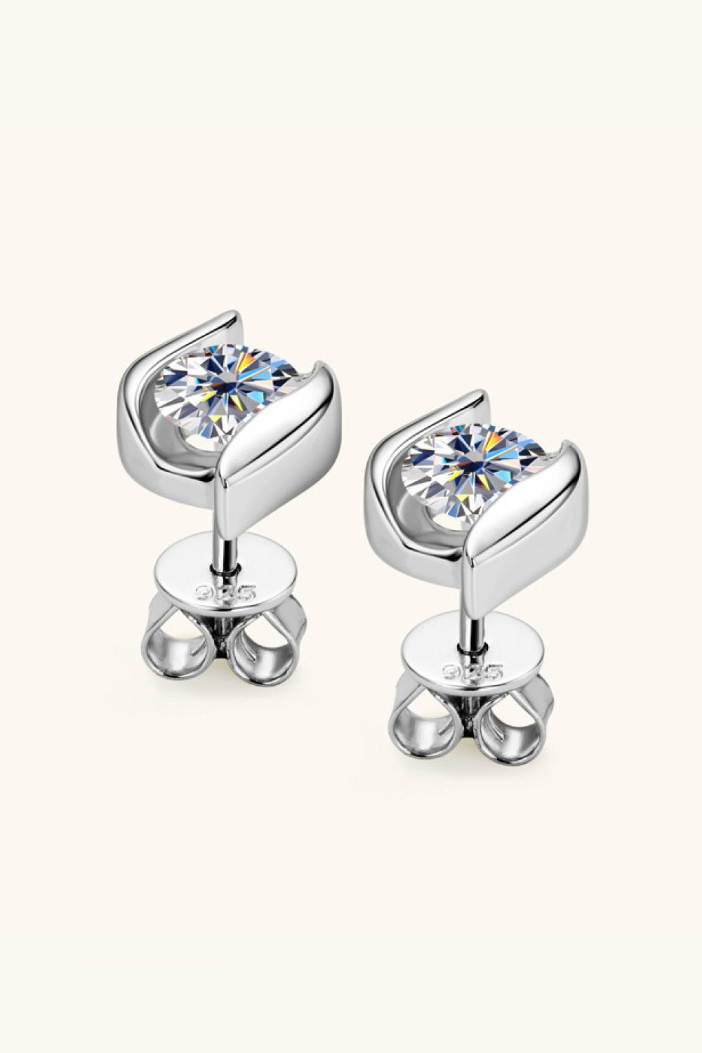 Sculpted solitaire stud earrings in 925 sterling silver with a single clear stone.