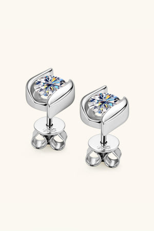 Sculpted solitaire stud earrings in 925 sterling silver with a single clear stone.