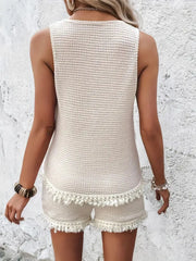 Cream waffle knit tank top with fringe hem and matching fringe shorts.