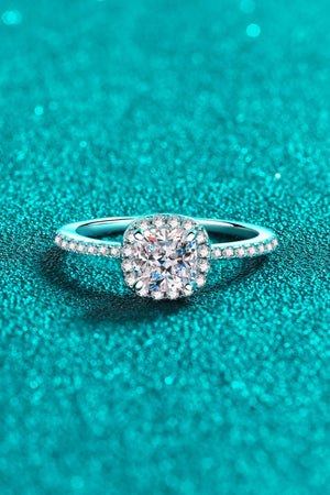 Silver pavé ring with cushion cut moissanite center stone.