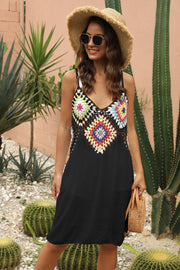 Black maxi dress with a colorful crochet yoke and spaghetti straps