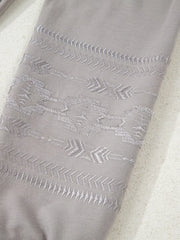 Gray sweatshirt with Aztec embroidery detail on sleeve