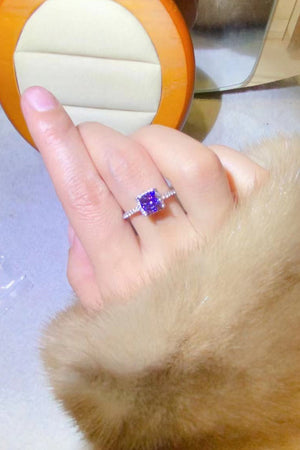 Purple cushion-cut moissanite halo ring with diamond band