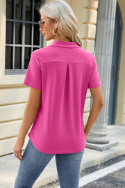 Hot Pink textured polo shirt with V-neck detail and short sleeves.