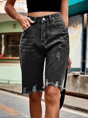 Black distressed knee-length denim cutoff shorts with frayed hem