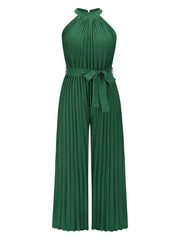 Dark green pleated palazzo jumpsuit with halter neckline and tie waist