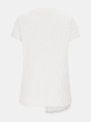 White textured tee with asymmetric hem and knot detail.