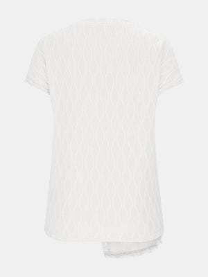 White textured tee with asymmetric hem and knot detail.