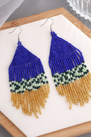Royal blue beaded fringe earrings with gold and green accents