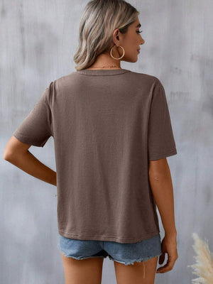 Taupe V-neck tee with short sleeves and crochet trim detail on the neckline.